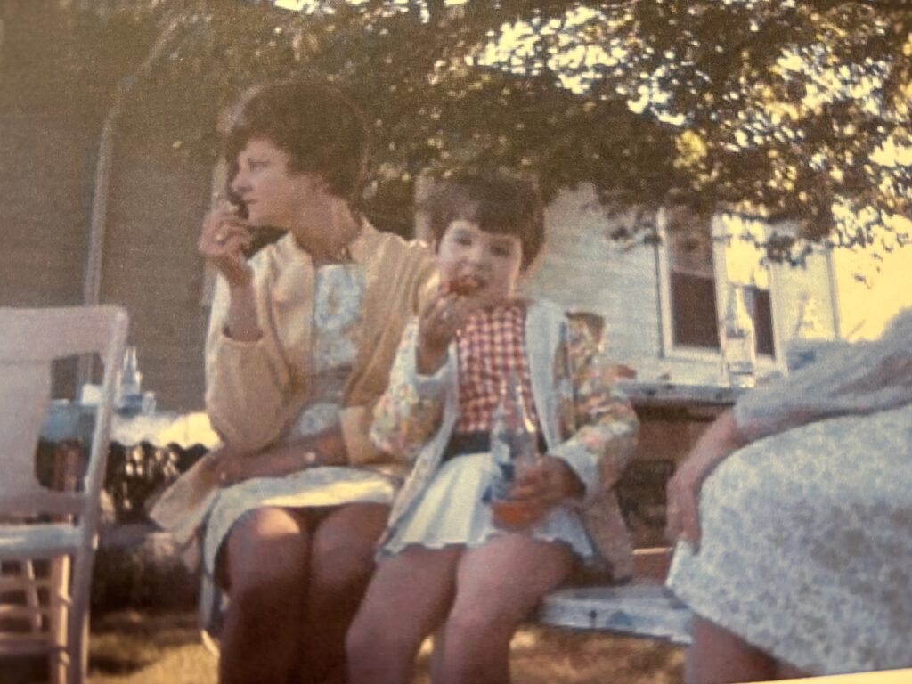 photo of young Carol with her mother enjoying a picnic. - courtesy The Craig Family Archives